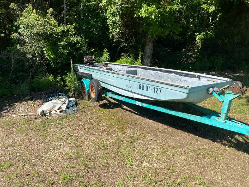 River Rat Jon Boat and Trailer with a 2002 15 HP Mercury Motor